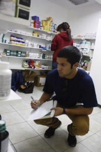 Students working in the pharmacy | Photo by Flying Samaritans.